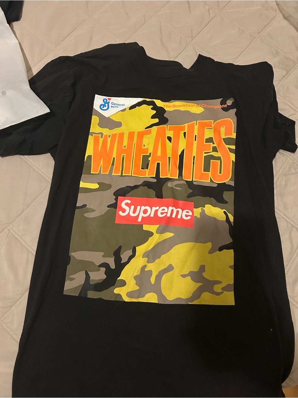 Supreme Black Long Sleeve Wheaties Camo Graphic Tee with Yellow & Red Accents
